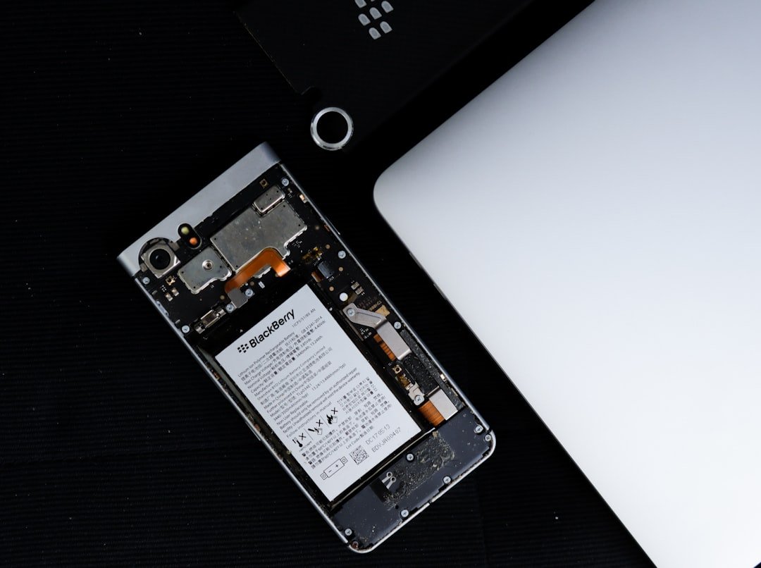 black android smartphone on black surface