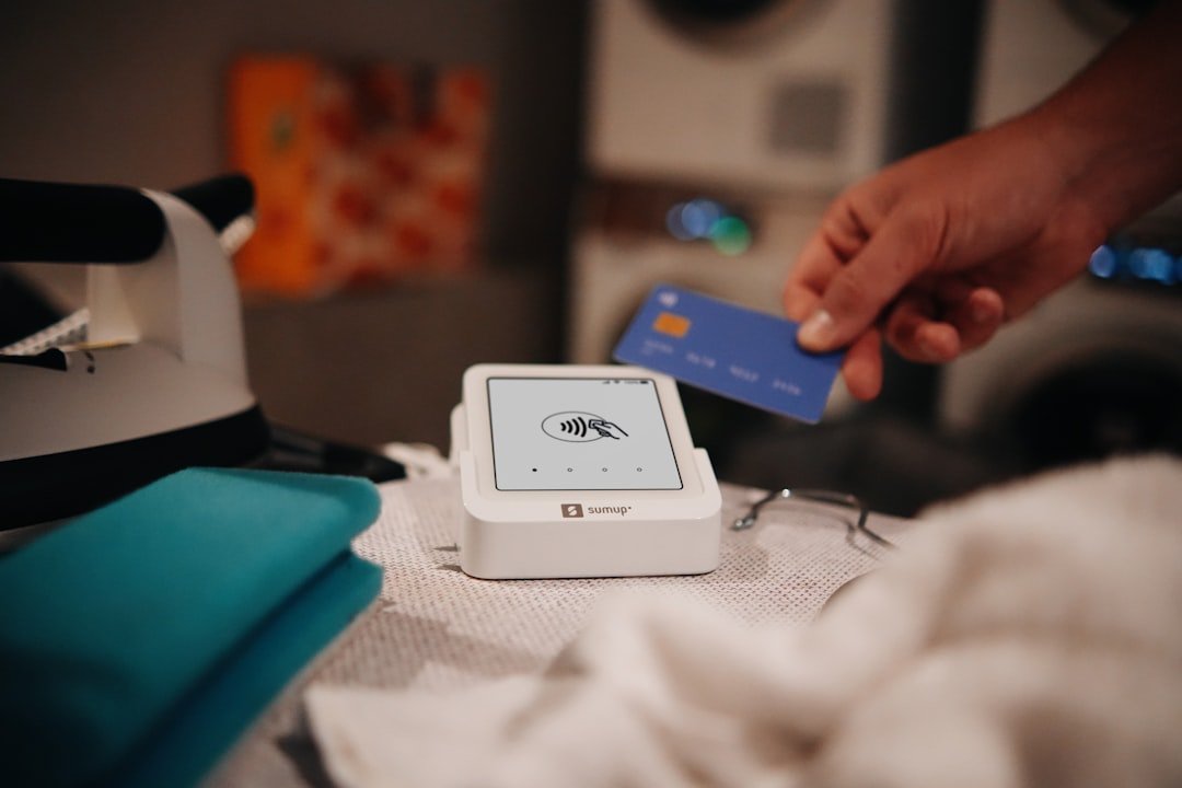 Paying with a credit card at a laundromat.