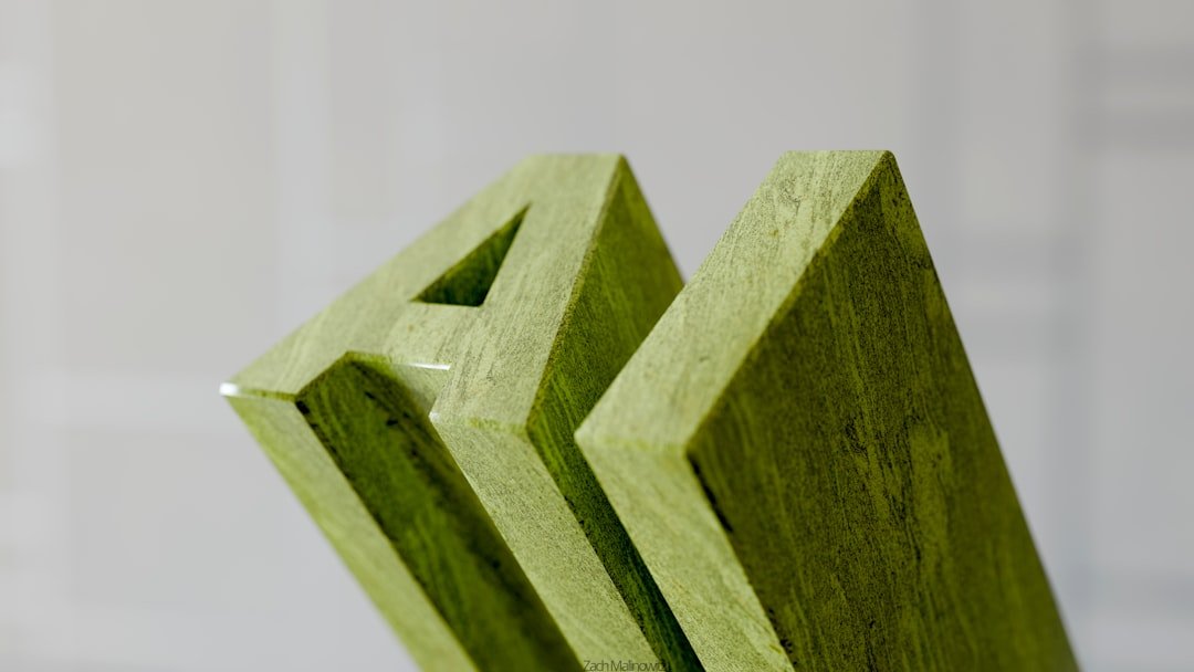 Green wooden letters spelling out 